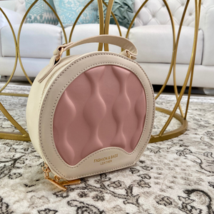 Bolso Redondo Con Textura Crema/Rosado
